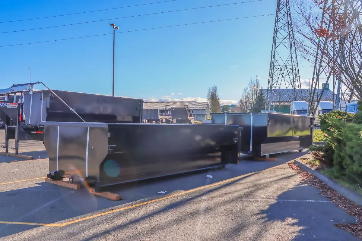 Roll-off dumpster ready for waste disposal at job site for 3 Yard Dumpster Rental in Bellaire